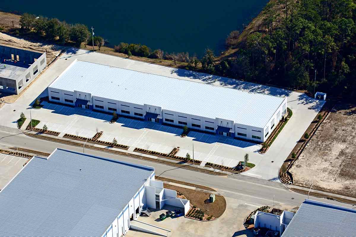 Aerial of a single-story, long bay metal building system with 45-ft bays in the rear at Port Jax Trade Center in Florida. 