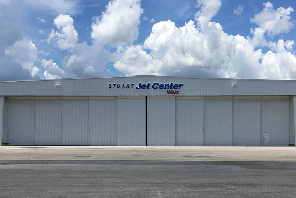 This 200-ft clear span hangar is one of several metal building systems housing airplanes at Stuart Jet Center in Florida.